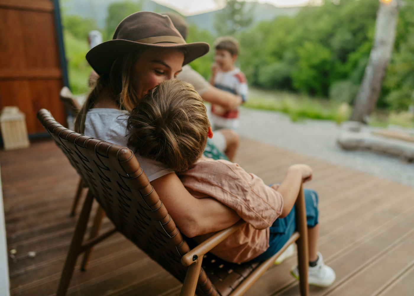 A lady with a child sitting in her lap