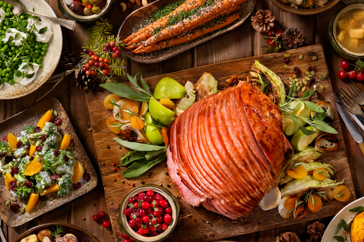 Glazed ham and food spread